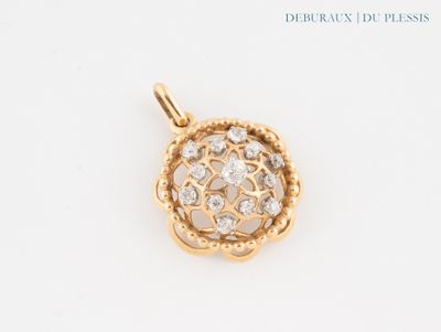 an image of a diamond pendant on a white surface