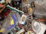 a basket full of assorted items and key chains
