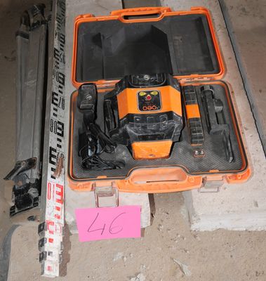 an orange and black electrical device on the wall