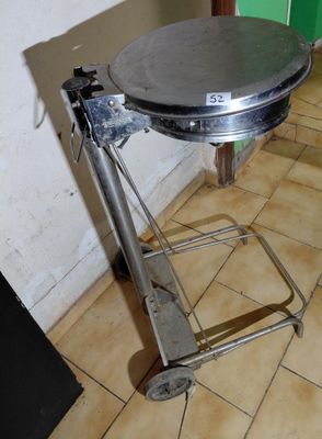 an image of a kitchen with a table on a cart