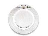 an overhead view of a white plate with a metal handle