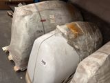 many bags of luggage sitting on the floor next to each other