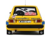 a yellow car with a sticker on the back of it