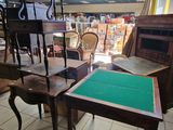 several pieces of furniture are sitting in a room with tile flooring