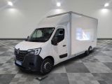 a picture of a white van parked in a large room
