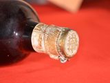 a bottle of wine that is sitting on a table