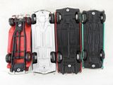 several toy cars are lined up in a row on top of each other