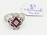 an image of a diamond and ruby ring with a price tag