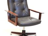 an image of a leather office chair with a wooden frame