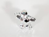 silver plated elephant figurine on a white background