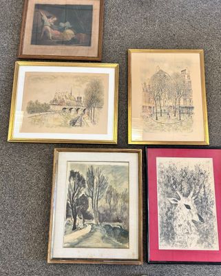four framed pictures of various types of artwork on a carpet