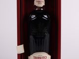 a bottle of wine in a red box on a white surface
