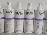 quatre flacons de lotion hydratante Urage Hydra Hydrazing posés sur une table