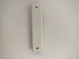 an image of a white door handle on a wall