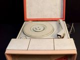 a wooden box with a record player inside of it