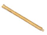 une broche en forme de barre, en or et diamants