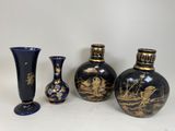 three vases sitting next to each other on a table