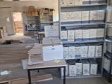 a room with a lot of boxes and boxes on the floor