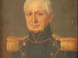 portrait of a man in a military uniform in a chair