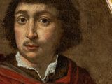 portrait of a young man in a red cloak and white shirt
