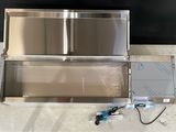 an image of a stainless steel freezer sitting on top of a counter