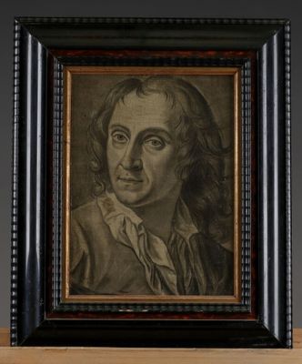 a portrait of a man with long hair in a black frame