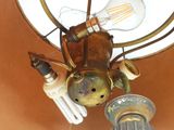 a light that is hanging from the ceiling in the room