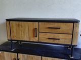 a wooden cabinet with drawers and drawers on top of it