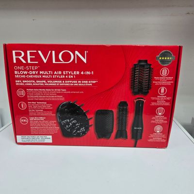 the box of a hair dryer is sitting on a table