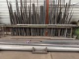 a pile of steel rods stacked on top of each other