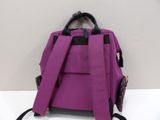 a close up of a purple backpack on a white surface