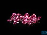 pink diamonds on a black background