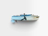 a small boat that is attached to a wall