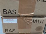 three boxes stacked on top of each other with labels on them