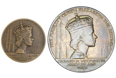 an image of a coin with a queen ' s head and a crown on it