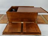 a wooden table with a drawer on top of it