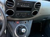 a car dashboard with a steering wheel and dashboard controls