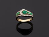 an emerald and diamond ring