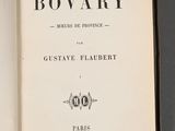 an open book with a black and white title on it