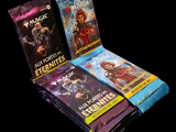 trois paquets de cartes « Magic : The Gathering » sur fond noir