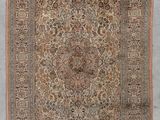 un ancien tapis persan à motif de médaillon