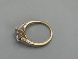 an image of a diamond ring on a table
