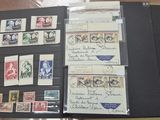 a black folder with a lot of stamps on it