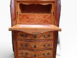 an old wooden desk with drawers and drawers on it