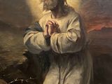 an oil painting of a man kneeling on a hill with a halo above his head