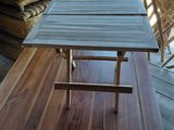 a table that is sitting on a wooden floor