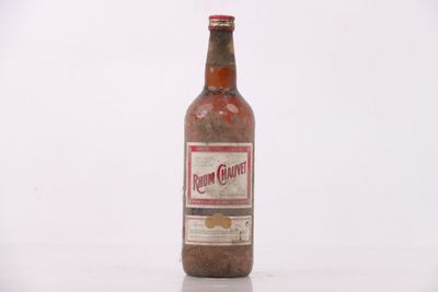 a bottle of beer that is sitting on a table