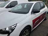 two white cars parked next to each other in a parking lot