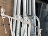 a ladder that is attached to the back of a truck