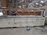 a picture of a machine that is working on a piece of wood